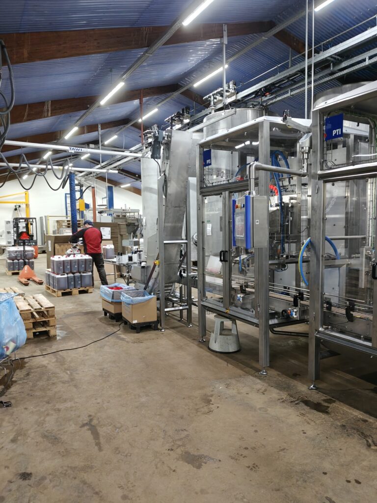 Dunkfylder i rustfrit stål til præcis påfyldning af flydende produkter i fødevareindustrien.